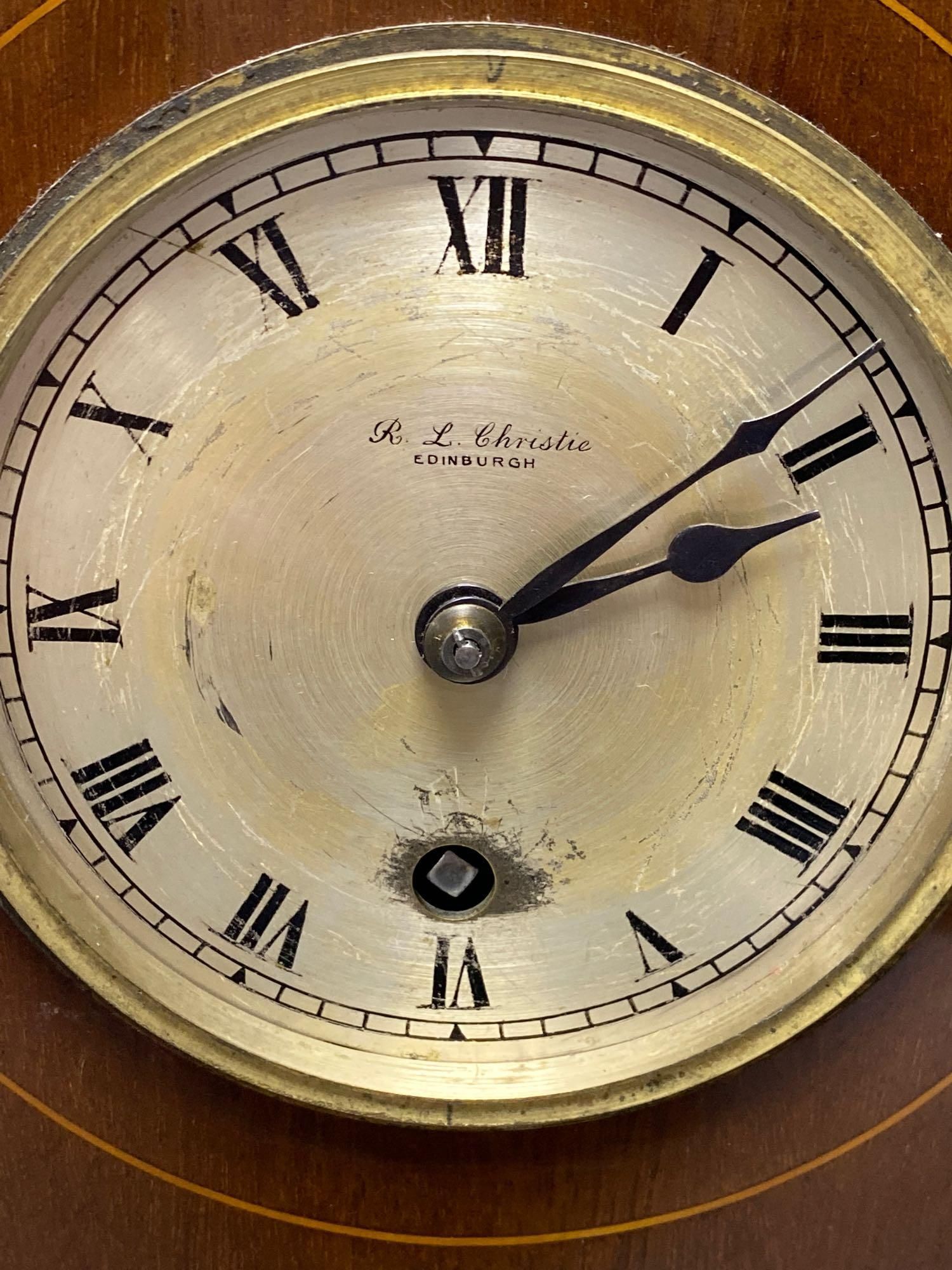 An Edwardian inlaid mahogany eight day mantel clock, with spring drive timepiece movement, 26cm